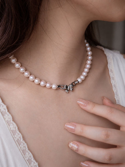 Mirror Pearl Necklace worn with the 925 sterling silver bow clasp at the front