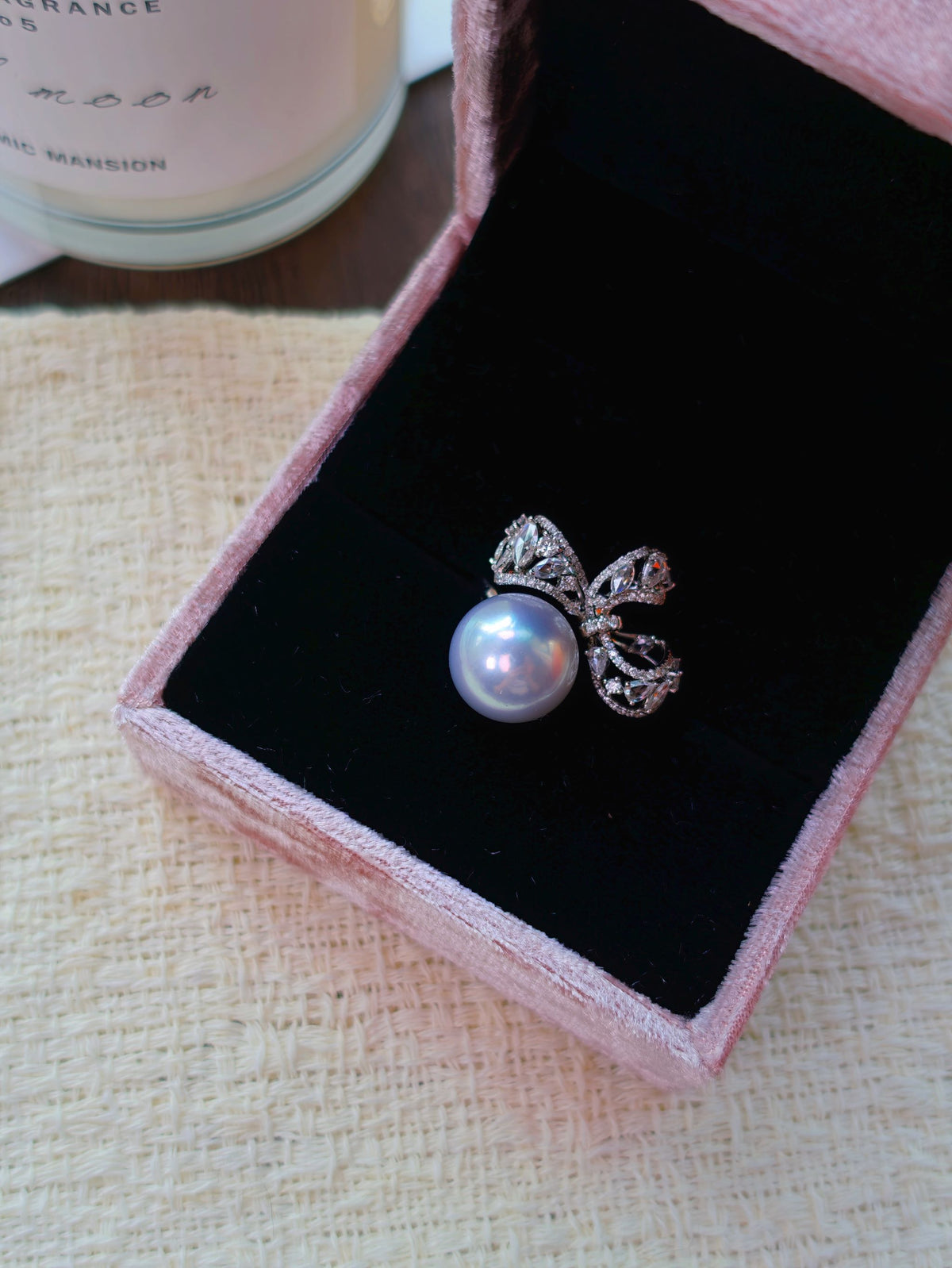 Cyrene Solitaire Bow Pearl Ring in gift box — 18K white gold diamond bow setting with rare silver-blue South Sea pearl