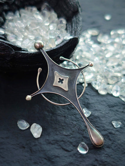 Cyrene Axiom Cross oxidized sterling silver statement earring, side angle detail with crystal stones background