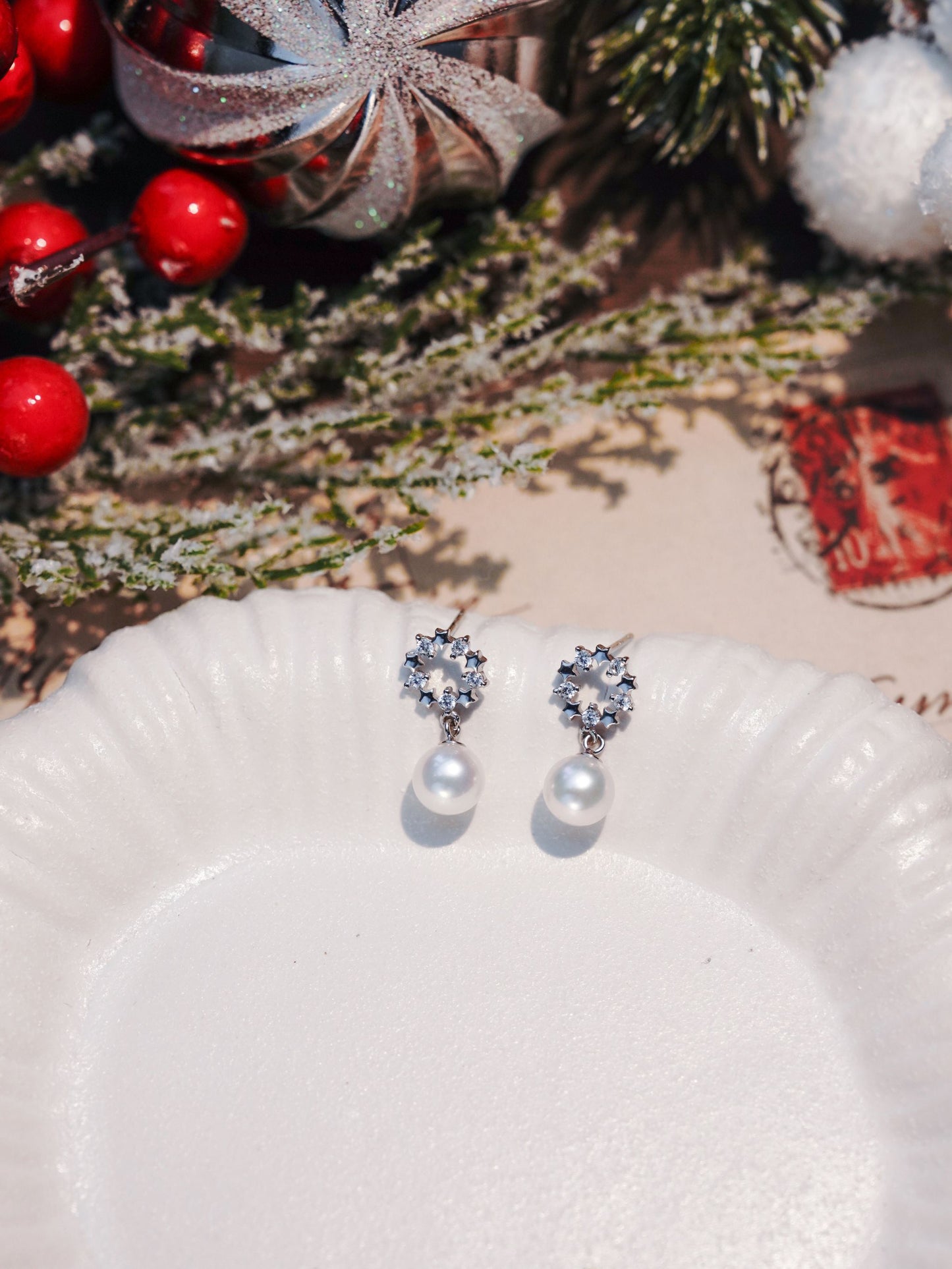 Cyrene's customizable dainty pearl crown earrings, designed to add a refined touch of sophistication to any outfit