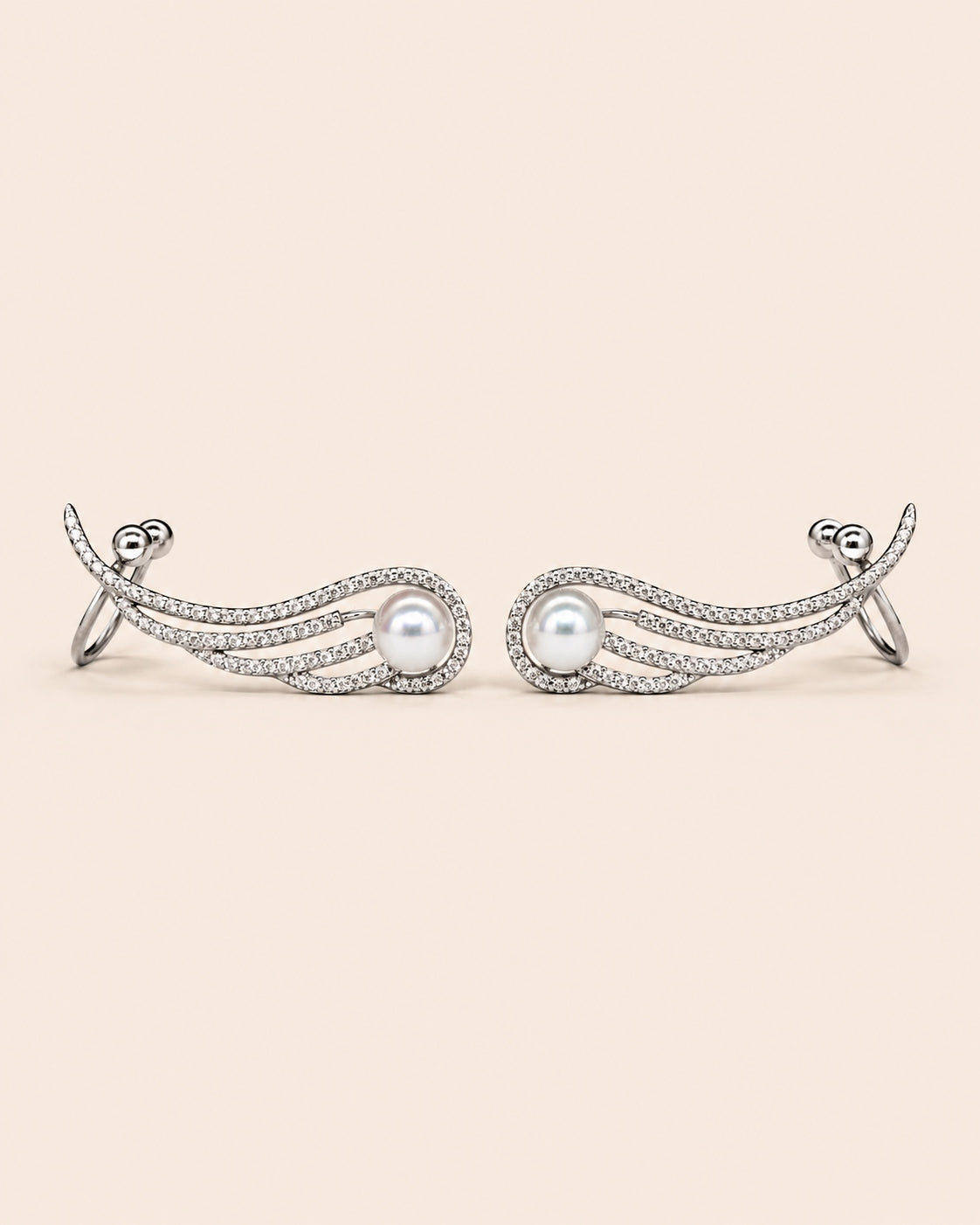 Featherrise Wing Ear Climber earrings with freshwater pearls and pavé CZ detailing in 925 sterling silver