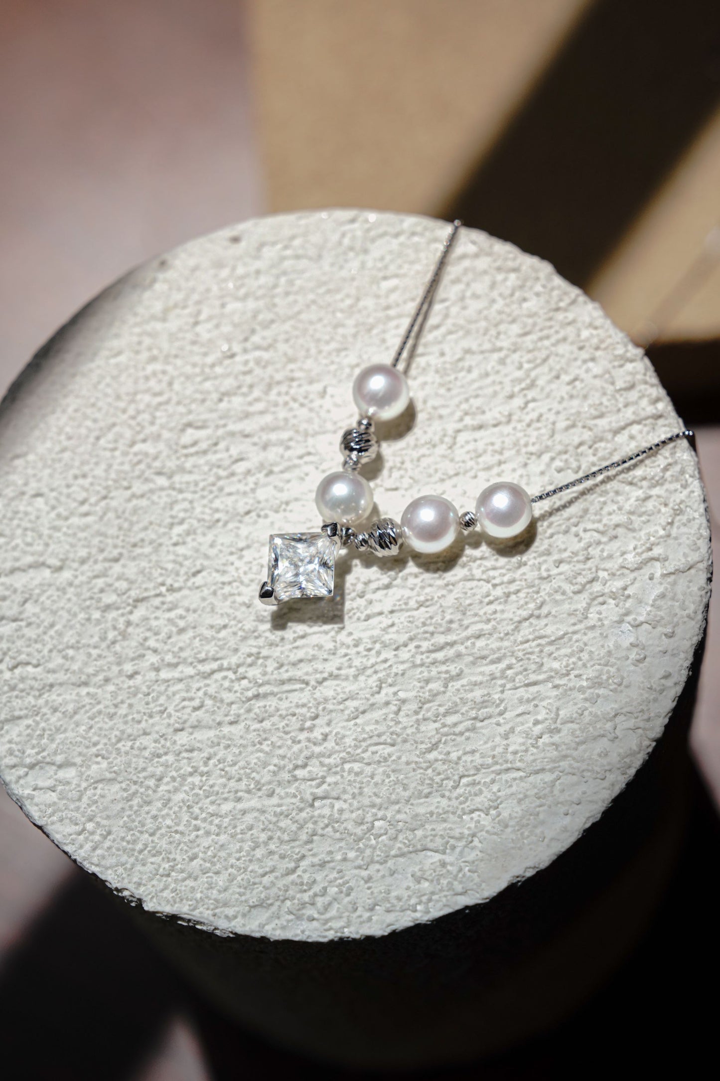 An elegant freshwater pearl wedding necklace by Cyrene, perfect for delicate bridal wear.
