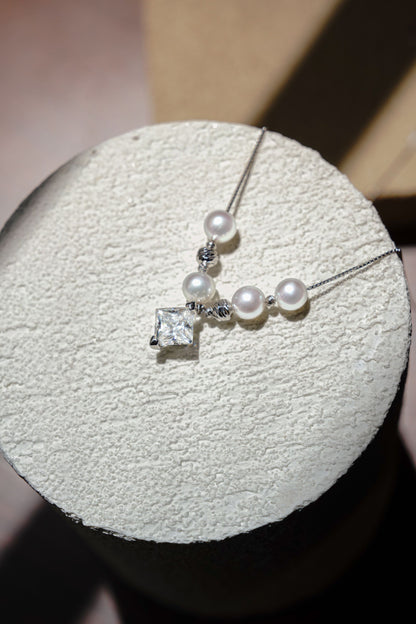 An elegant freshwater pearl wedding necklace by Cyrene, perfect for delicate bridal wear.