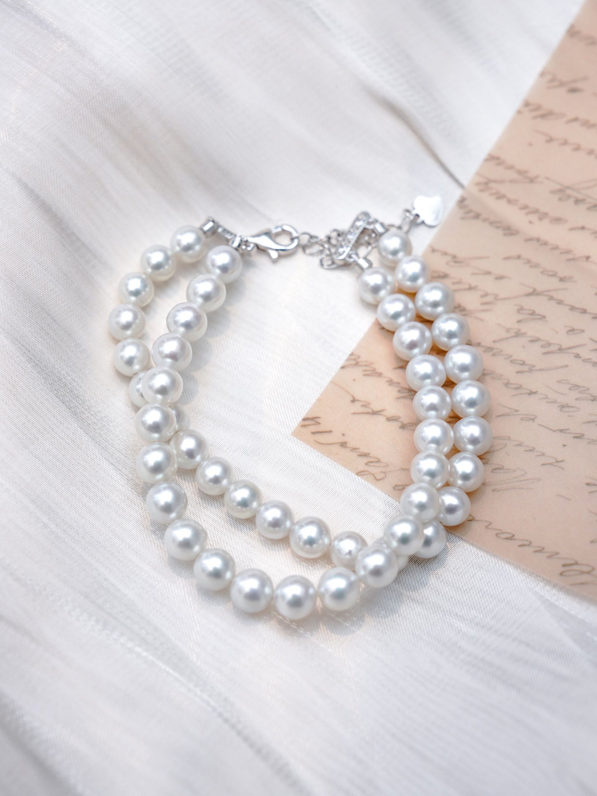 An elegant double-layered full strand pearl bracelet, showcasing perfectly matched premium freshwater pearls.