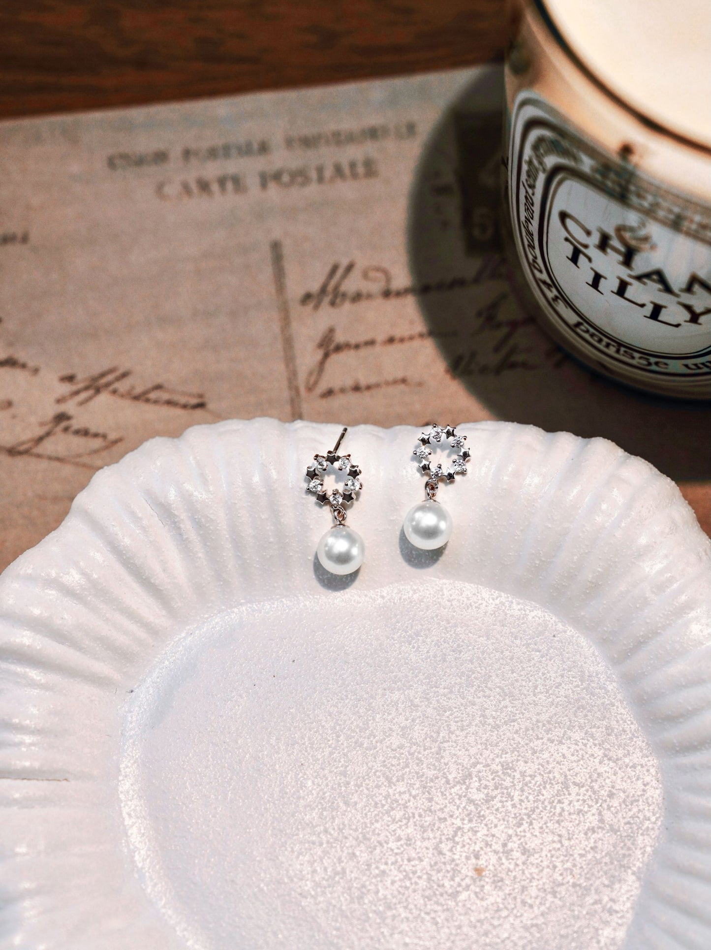 Exquisite everyday freshwater pearl jewelry by Cyrene, highlighting a brilliant small crown and halo design