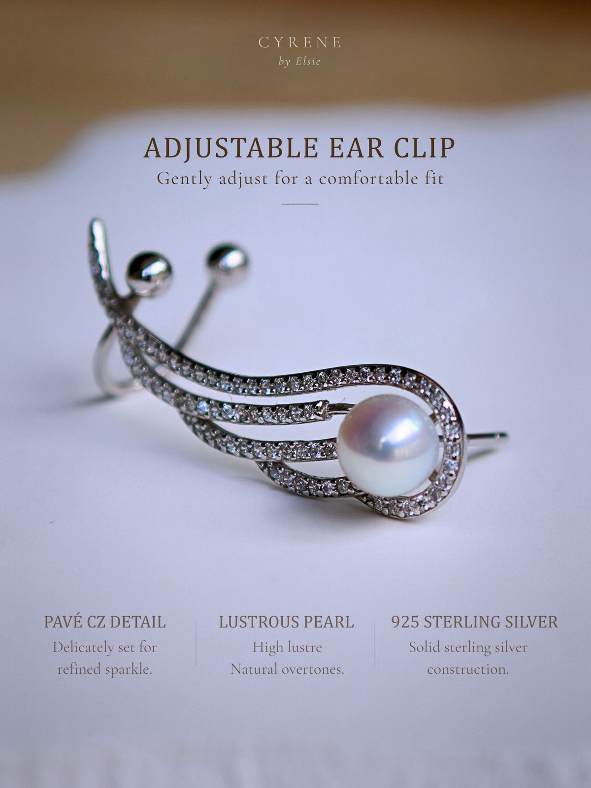 Featherrise Wing Pearl Ear Climber detail highlighting its lustrous freshwater pearl, 925 sterling silver, pavé CZ and adjustable ear clip