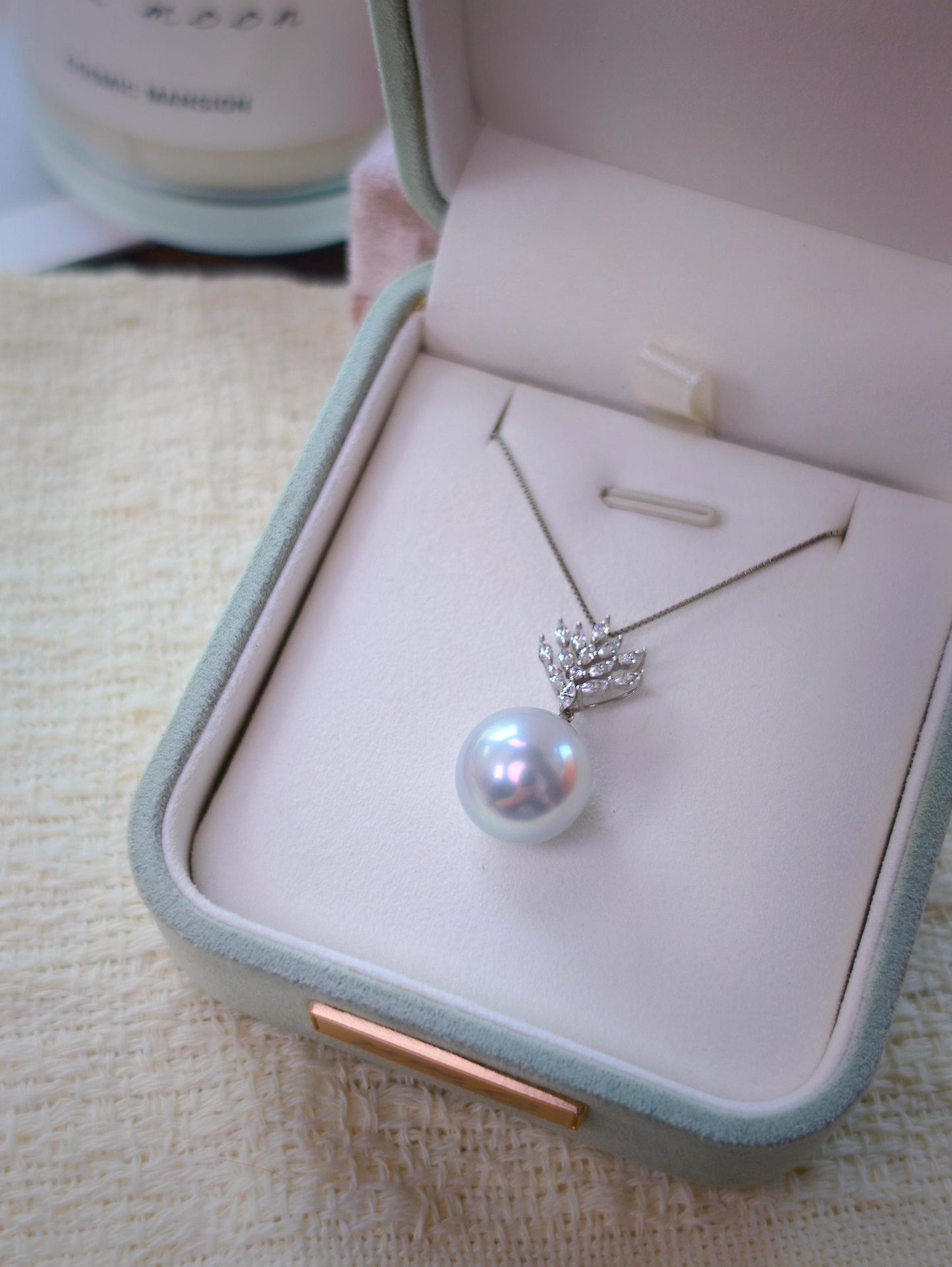Cyrene Lone Drop Pearl Pendant in jewelry box — 13.3mm South Sea pearl with 18K white gold setting, complimentary chain