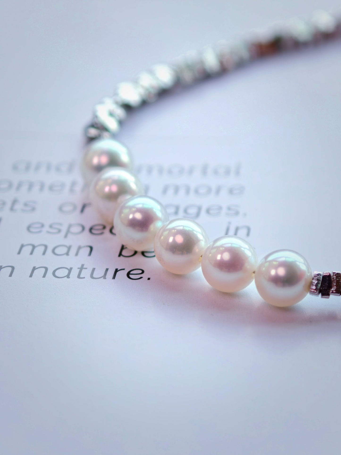 Close-up of Cyrene Relic Fragment Pearl Bracelet, aurora freshwater pearls and crushed silver texture detail