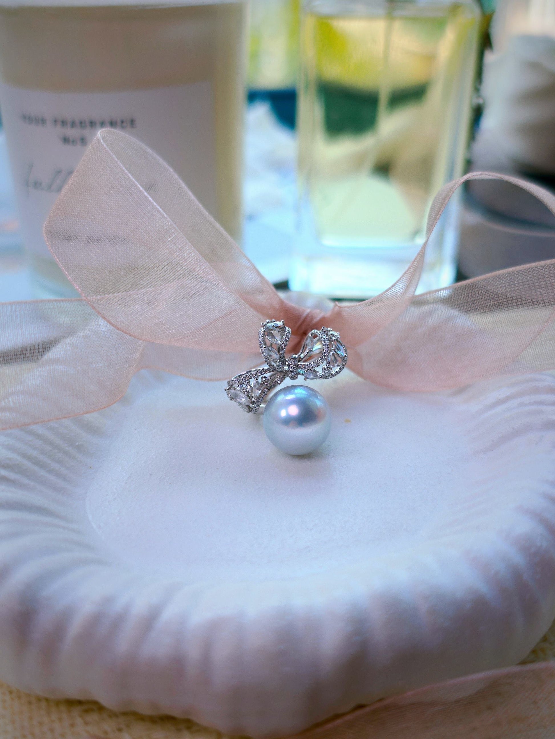Cyrene Solitaire Bow Pearl Ring with ribbon styling — one-of-one South Sea pearl and diamond ring detail