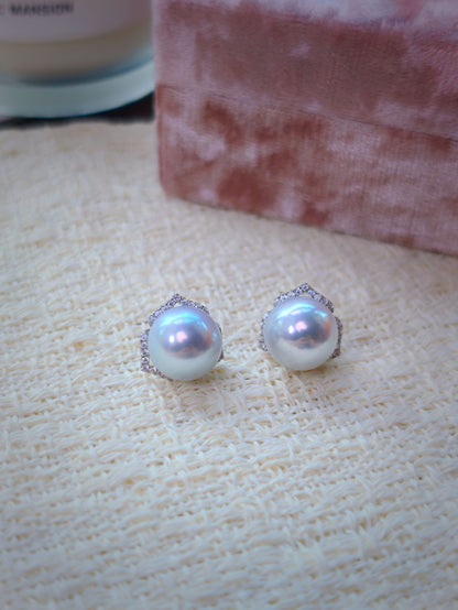 Cyrene Trio Bloom Pearl Earrings with three-petal 18K white gold and CZ jacket, flatlay pair