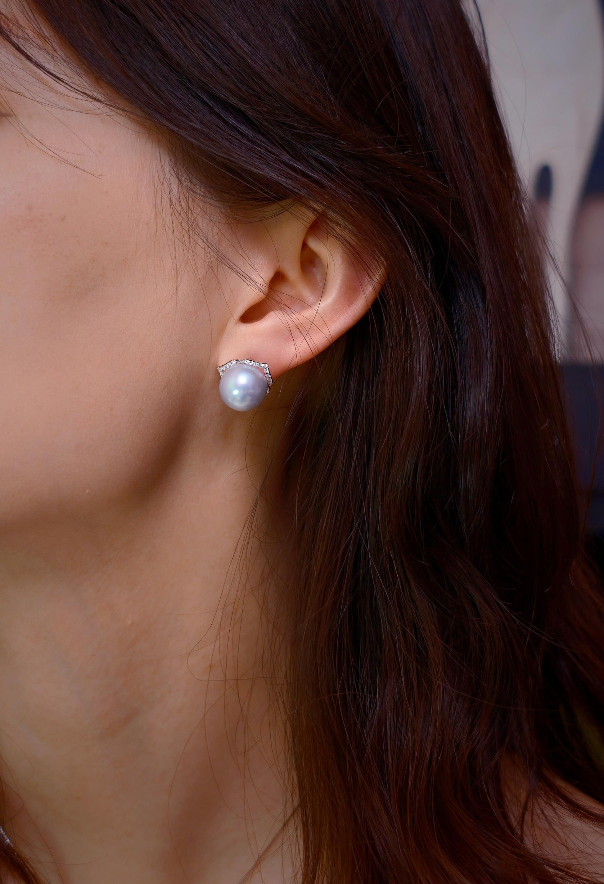 Cyrene Trio Bloom Pearl Earrings worn as plain stud without jacket — South Sea pearl on ear, close-up